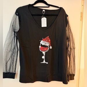 Black Top with Sheer Sleeves and Festive Graphic